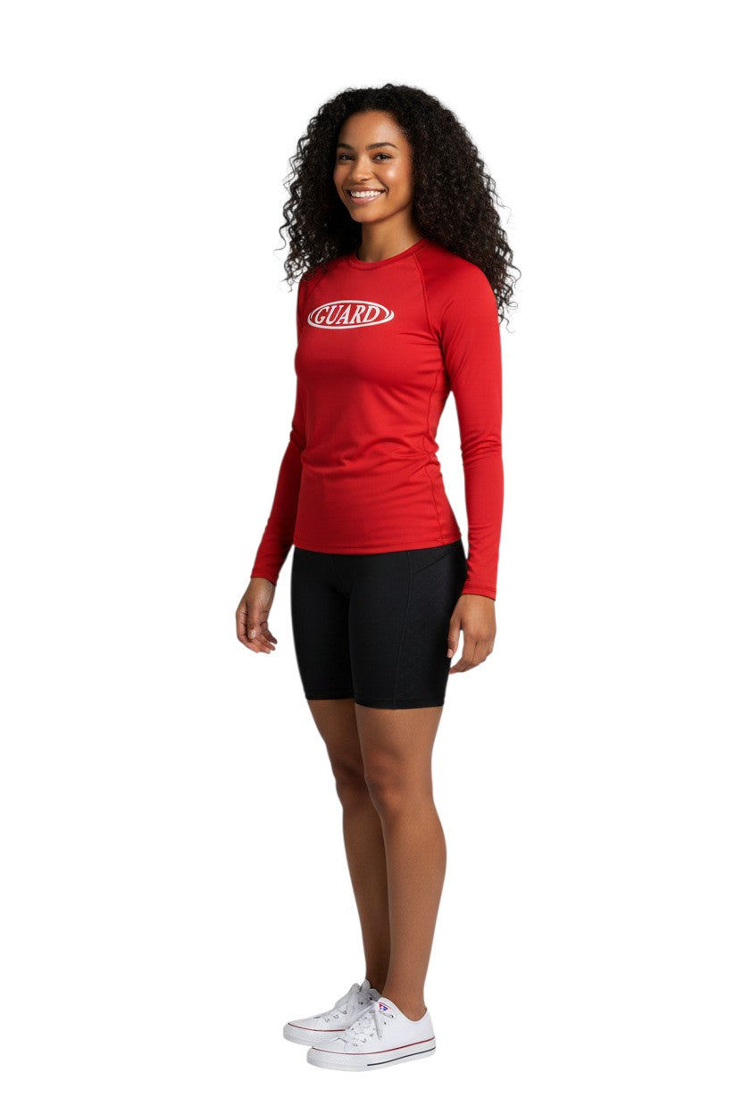 The Lifeguard Store red long sleeve crew neck rashguard with white GUARD logo on chest. UPF50+ protection.
