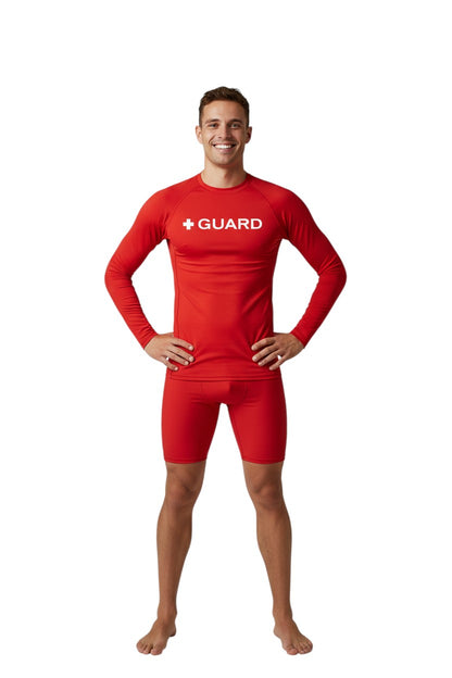 The Lifeguard Store red long sleeve crewneck rashguard with white + GUARD text on chest. Polyester-spandex blend.