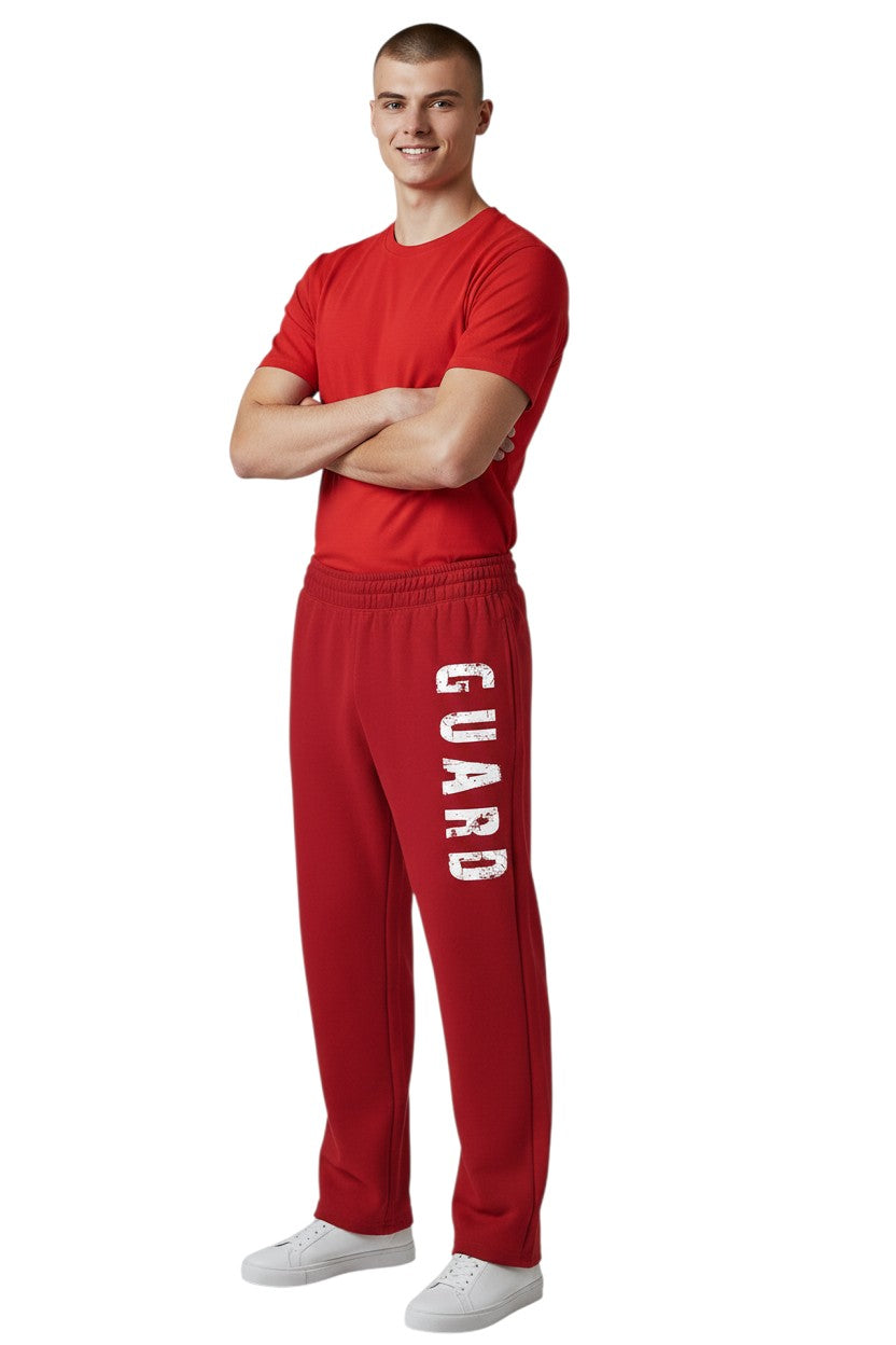 The Lifeguard Store red fleece sweatpants with white distressed "GUARD" logo down the leg. Side pockets and drawstring.