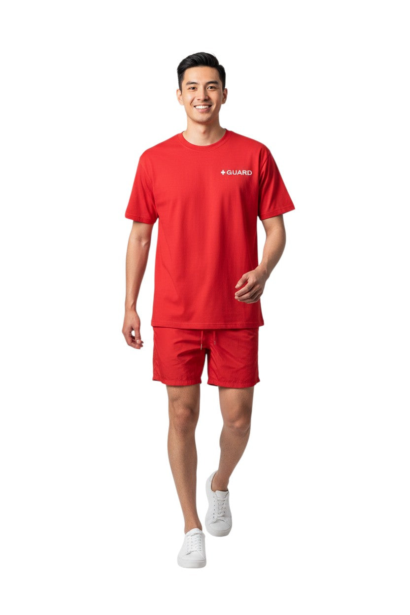 The Lifeguard Store red short-sleeve Dri-Fit tee with white GUARD logo on chest. 100% polyester.