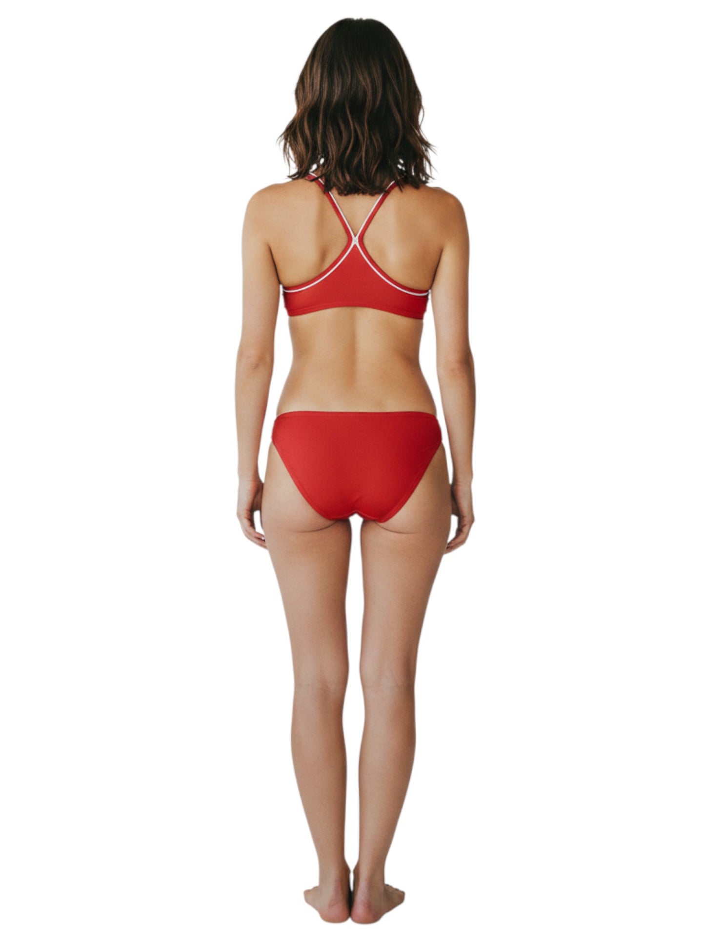 The Lifeguard Store red H-back reversible bikini worn by a woman, showing the secure back strap design.