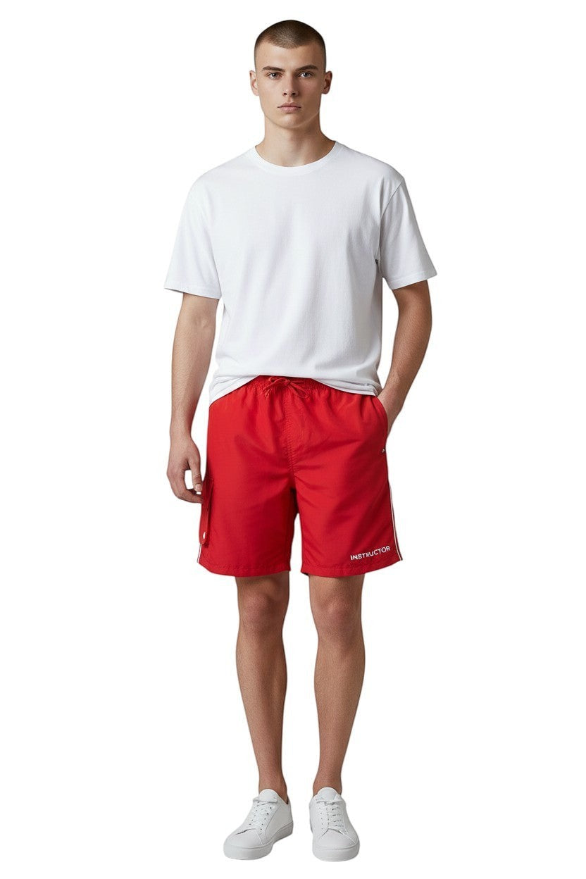 The Lifeguard Store red polyester board shorts with liner, elastic waistband, drawstring, and 7" inseam.