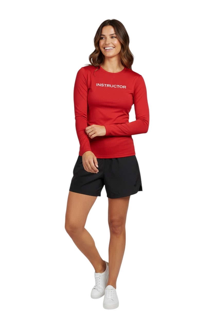 The Lifeguard Store red long sleeve rashguard with "INSTRUCTOR" printed on the chest. Made of poly-spandex blend for comfort and UPF 50+ sun protection.