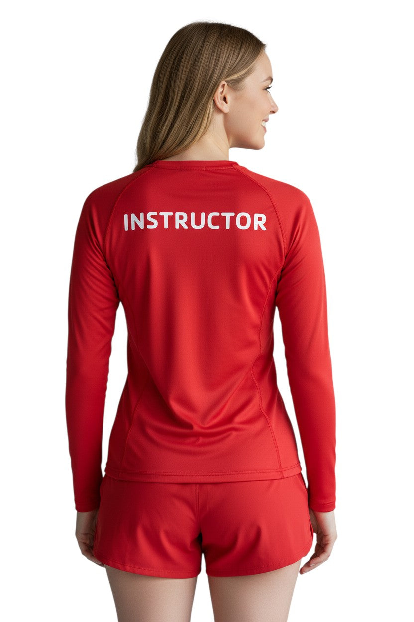 The Lifeguard Store YMCA Kiefer Instructor long sleeve rashguard in red. Made of 91% polyester and 9% spandex with UPF50+ UV protection.