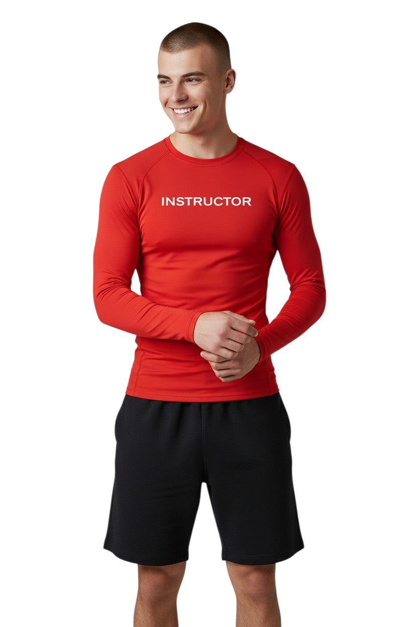The Lifeguard Store red long sleeve rashguard with "INSTRUCTOR" printed on the chest. Made of poly-spandex blend with UPF50+ protection.