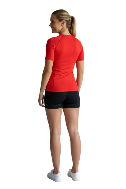 The Lifeguard Store red short sleeve crew neck rashguard with white 'INSTRUCTOR' oval logo on chest. Made of poly-spandex fabric.