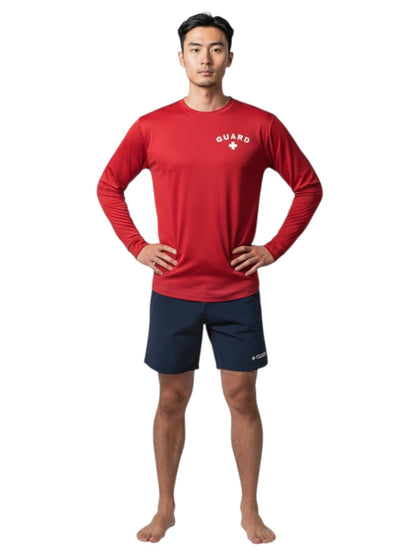 The Lifeguard Store red long sleeve Dri-Fit guard shirt with white logo worn by a male lifeguard in navy shorts
