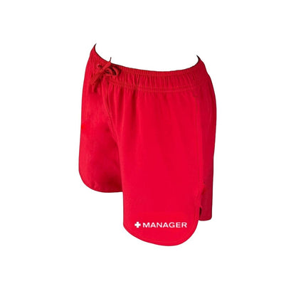 The Lifeguard Store red polyester 5" inseam women's manager shorts with elastic waistband and drawstring. Features "+ MANAGER" logo.
