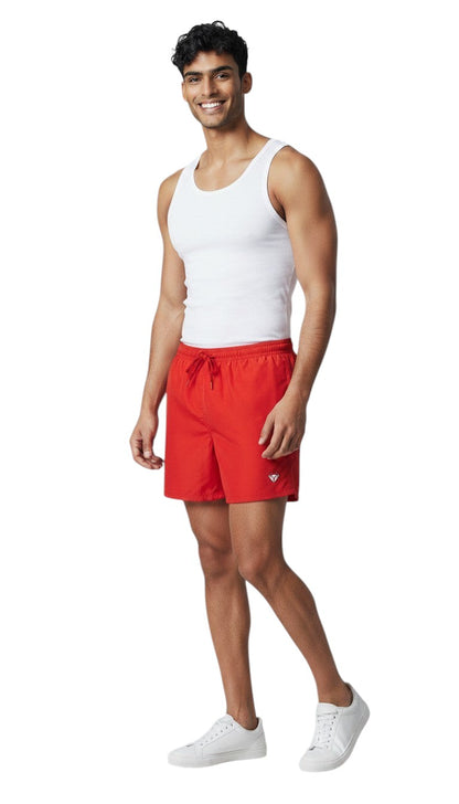 The Lifeguard Store red polyester 5" swim shorts with liner, elastic waistband, drawstring, and two front pockets.