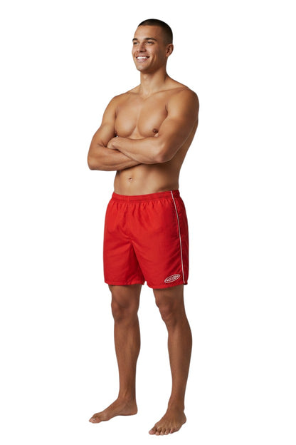 The Lifeguard Store red nylon lifeguard trunks with elastic waistband, drawstring, side pockets, and GUARD logo. 5" inseam.