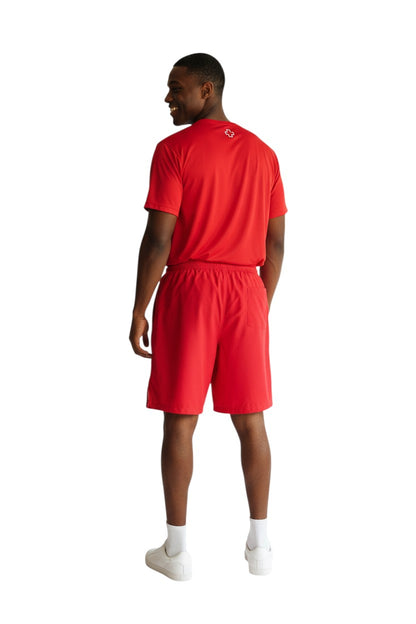 The Lifeguard Store red polyester board shorts with elastic waistband and 7" inseam. Features UPF 50+ protection.