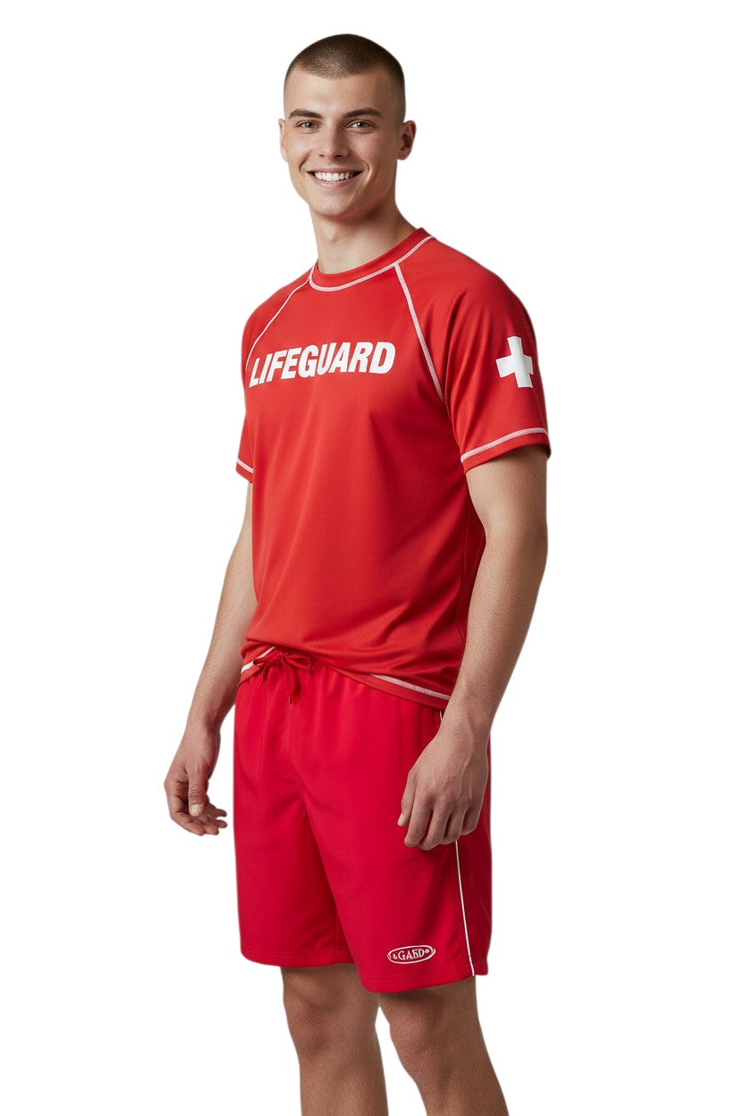 The Lifeguard Store red polyester board shorts with white piping and drawstring waist. Features 7" inseam.
