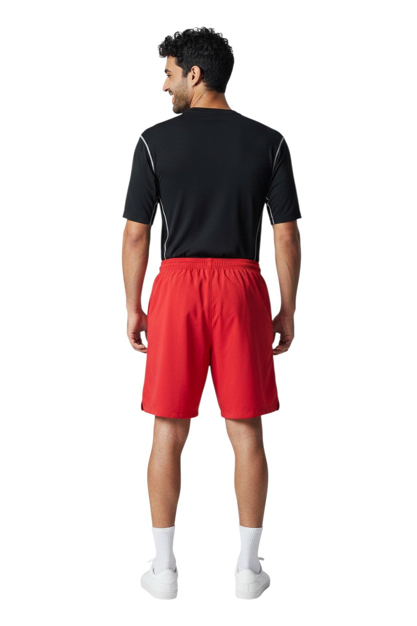 The Lifeguard Store red polyester board shorts with elastic waistband and 7" inseam. Features UPF 50+ protection.