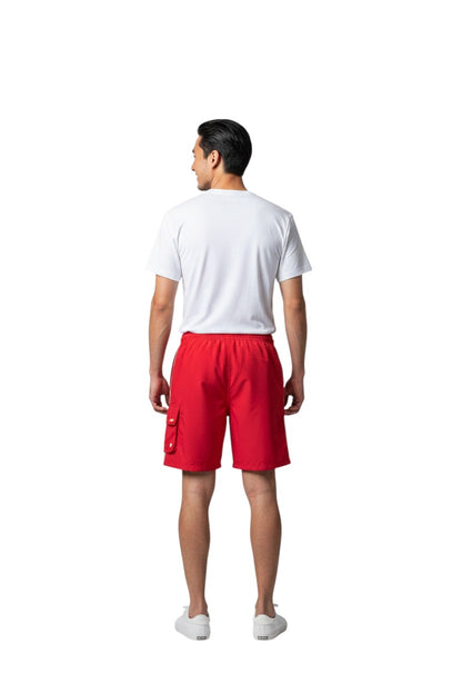 The Lifeguard Store red polyester board shorts with liner, elastic waistband, drawstring, cargo pocket, and "STAFF" logo.