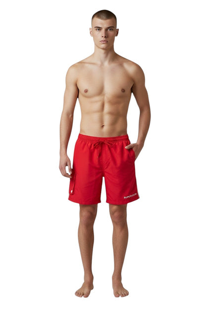 The Lifeguard Store red polyester board shorts with liner, elastic waistband, drawstring, and cargo pocket. Features UPF30+ protection.
