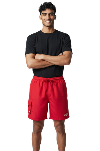 The Lifeguard Store red polyester board shorts with elastic waistband, drawstring, cargo pocket, and supervisor logo. 7" inseam.