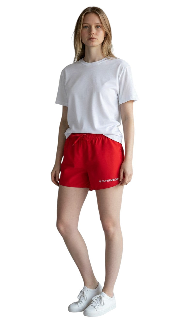 The Lifeguard Store red polyester 5" shorts with elastic waistband, drawstring, and white "SUPERVISOR" logo.