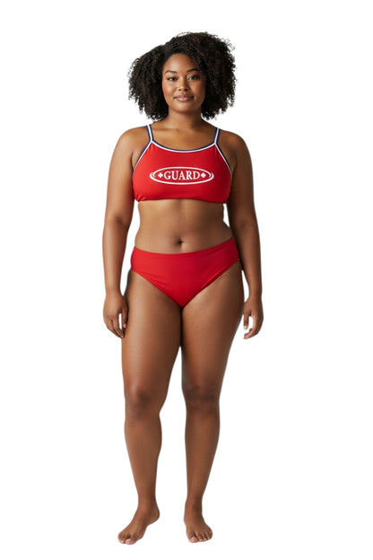 Model wearing The Lifeguard Store red tri-color bikini with white and blue trim and GUARD text on the chest