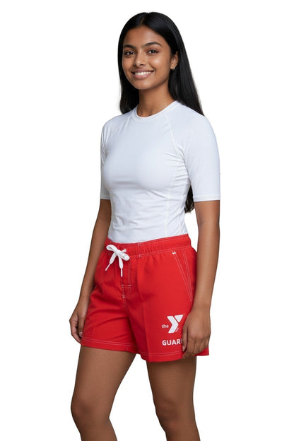 The Lifeguard Store red polyester swim shorts with 5" inseam, elastic waistband, drawstring, and YMCA Guard logo.