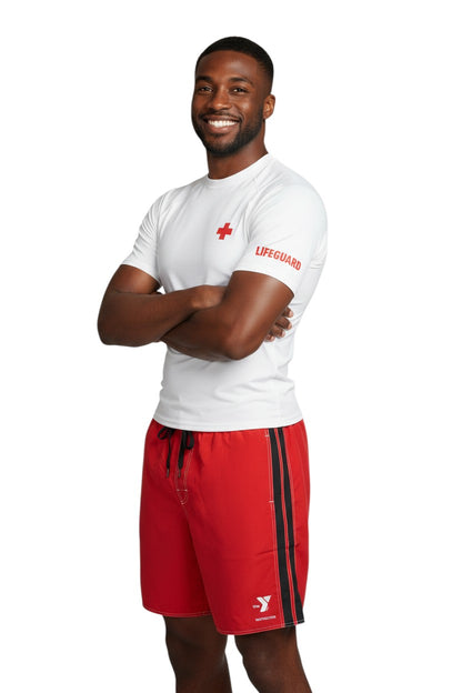 The Lifeguard Store red polyester board shorts with black side stripe, drawstring waist, and YMCA Instructor logo.