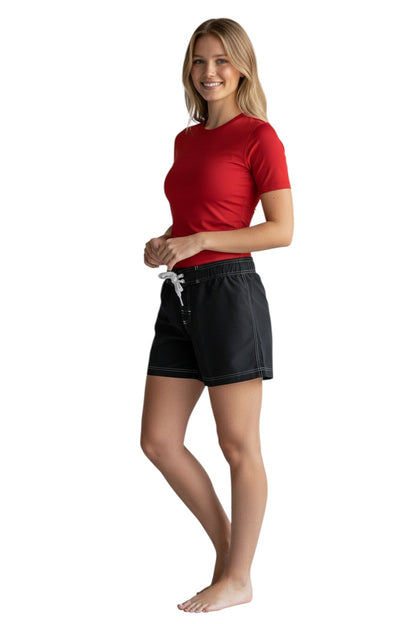 The Lifeguard Store RISE Solid Female Flex Short in black polyester with white contrast stitching, drawstring waist, and side pocket.