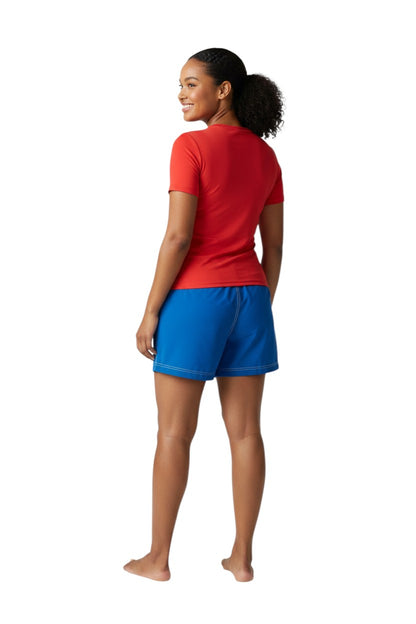 The Lifeguard Store RISE Solid Female Flex Short in royal blue polyester with white contrast stitching, drawstring waist, and side pocket.