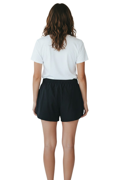 The Lifeguard Store RISE Guard black polyester roll shorts with elastic waistband and drawstring, 4-inch inseam.