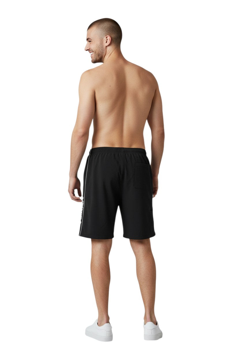 The Lifeguard Store black polyester spandex RISE Guard Flex Short with white piping and embroidered logo.