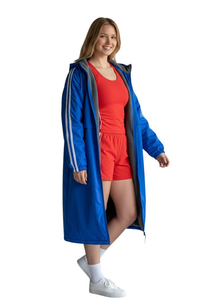 The Lifeguard Store RISE Guard Splice Parka in royal blue nylon with white stripes on sleeves and fleece lining.