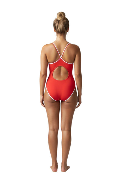 The Lifeguard Store RISE Solid H-Back Reversible one-piece swimsuit in red with white trim and a circular cutout on the back. Made of poly stretch fabric.