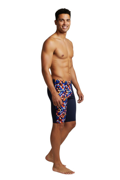 The Lifeguard Store RISE Sandies Breakout Poly Jammer swimsuit with a geometric pattern in blue, orange, and white on the left leg and navy blue on the right.