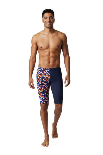 The Lifeguard Store RISE Sandies Breakout Poly Jammer swimsuit with a geometric pattern in blue, orange, and white on the left leg and navy blue on the right leg.