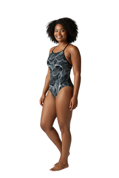 The Lifeguard Store RISE Sandies female Helix swimsuit with abstract white wavy lines on black. Polyester/Spandex blend.