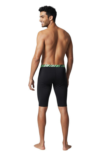 The Lifeguard Store RISE Sandies black poly jammer swimsuit with green and white striped waistband. UPF 50+.