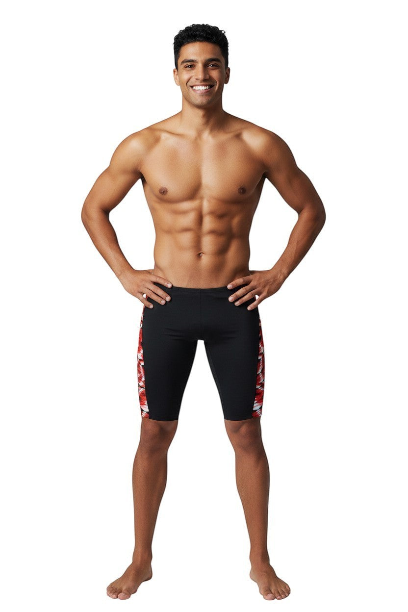 The Lifeguard Store RISE Sandies Swerve Poly Jammer swimsuit in black with a red, white, and black geometric side panel. Made of 91% Polyester/9% Spandex.