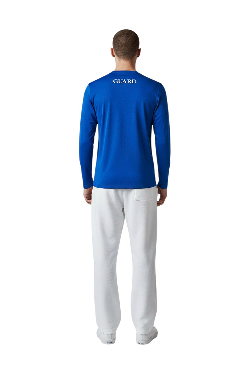 The Lifeguard Store royal blue long sleeve crew neck rashguard with GUARD text on back. Polyester-spandex blend.