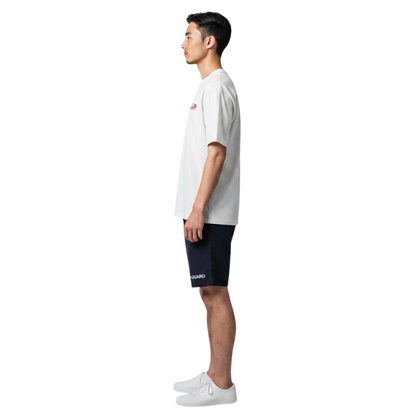 The Lifeguard Store white cotton Attendant tee worn by a man in profile view, featuring short sleeves and a relaxed fit