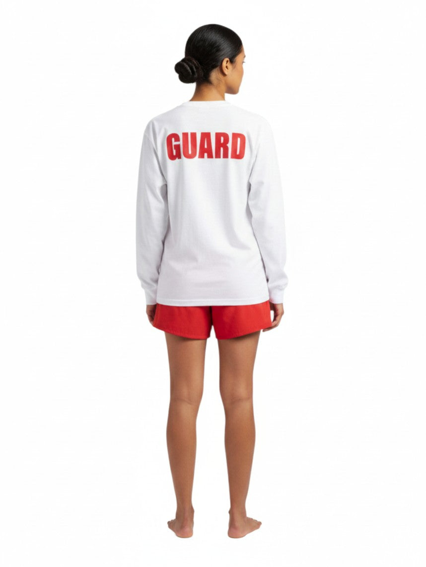 The Lifeguard Store white long sleeve Dri-Fit shirt with red GUARD text on the back worn by a female lifeguard