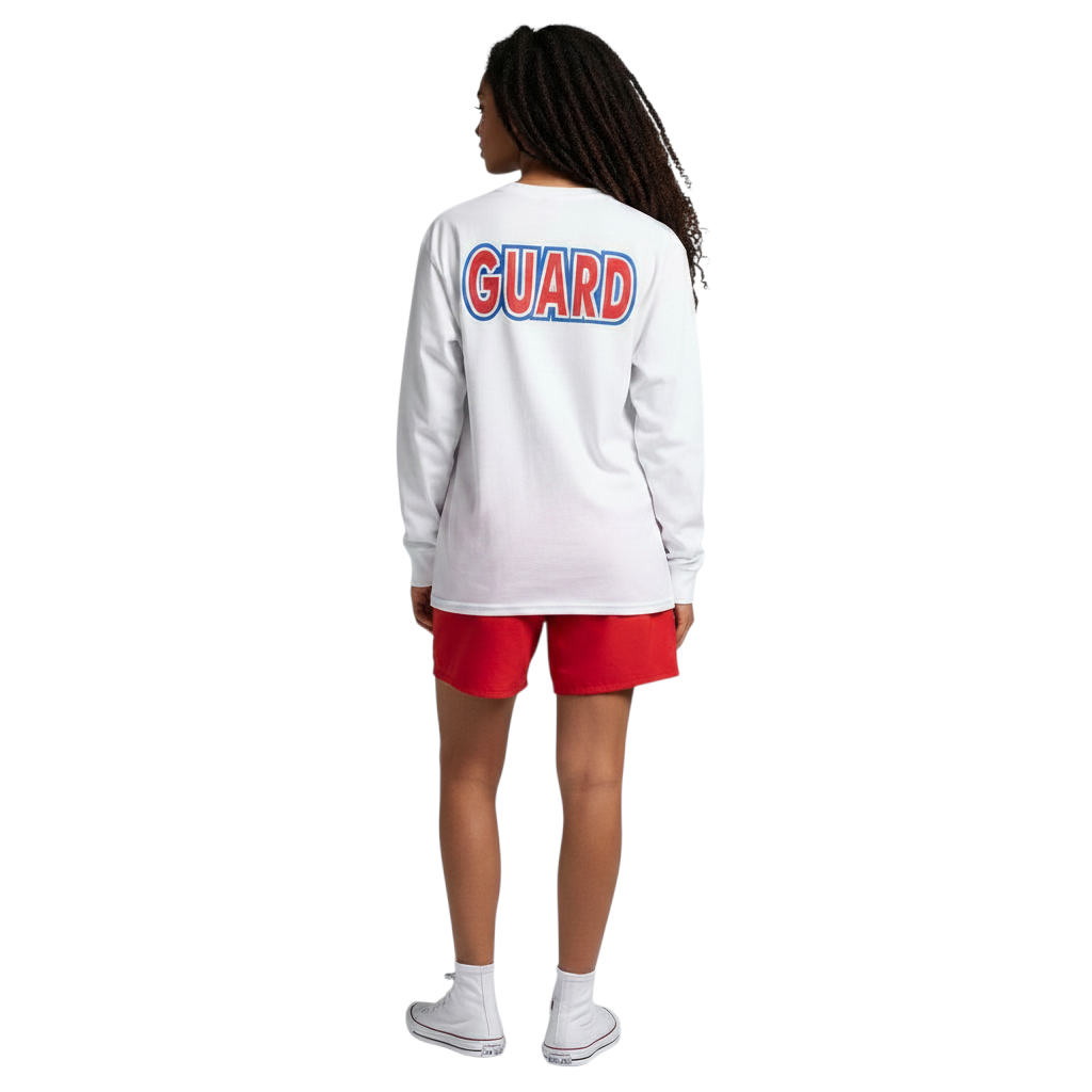 The Lifeguard Store white long sleeve Guard tee with red and blue back logo worn by a woman with red shorts