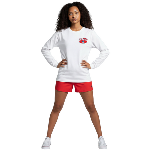 Model wearing The Lifeguard Store white long sleeve cotton jersey tee with red Guard logo and matching red shorts