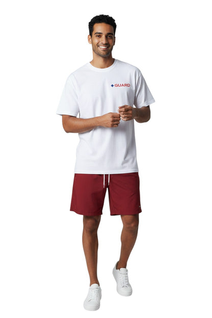 The Lifeguard Store white 100% polyester short sleeve tee with blue and red GUARD logo on chest. Dri-FIT technology.