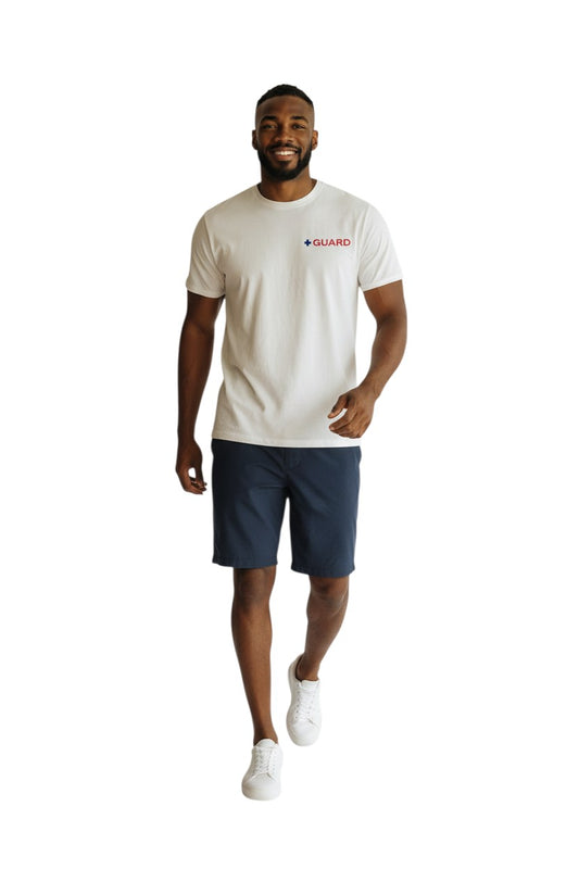The Lifeguard Store white 100% cotton short sleeve tee with blue and red GUARD logo on chest.