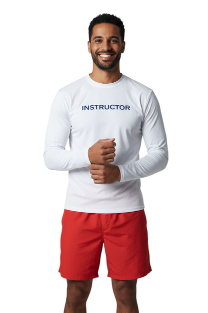 The Lifeguard Store white long sleeve rashguard with "INSTRUCTOR" text in navy blue on the chest. Made of poly stretch fabric.