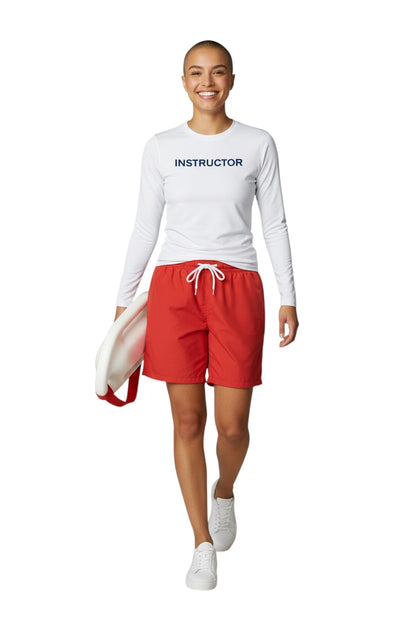 The Lifeguard Store white long sleeve rashguard with "INSTRUCTOR" printed in navy blue on the chest. Made of poly stretch fabric.