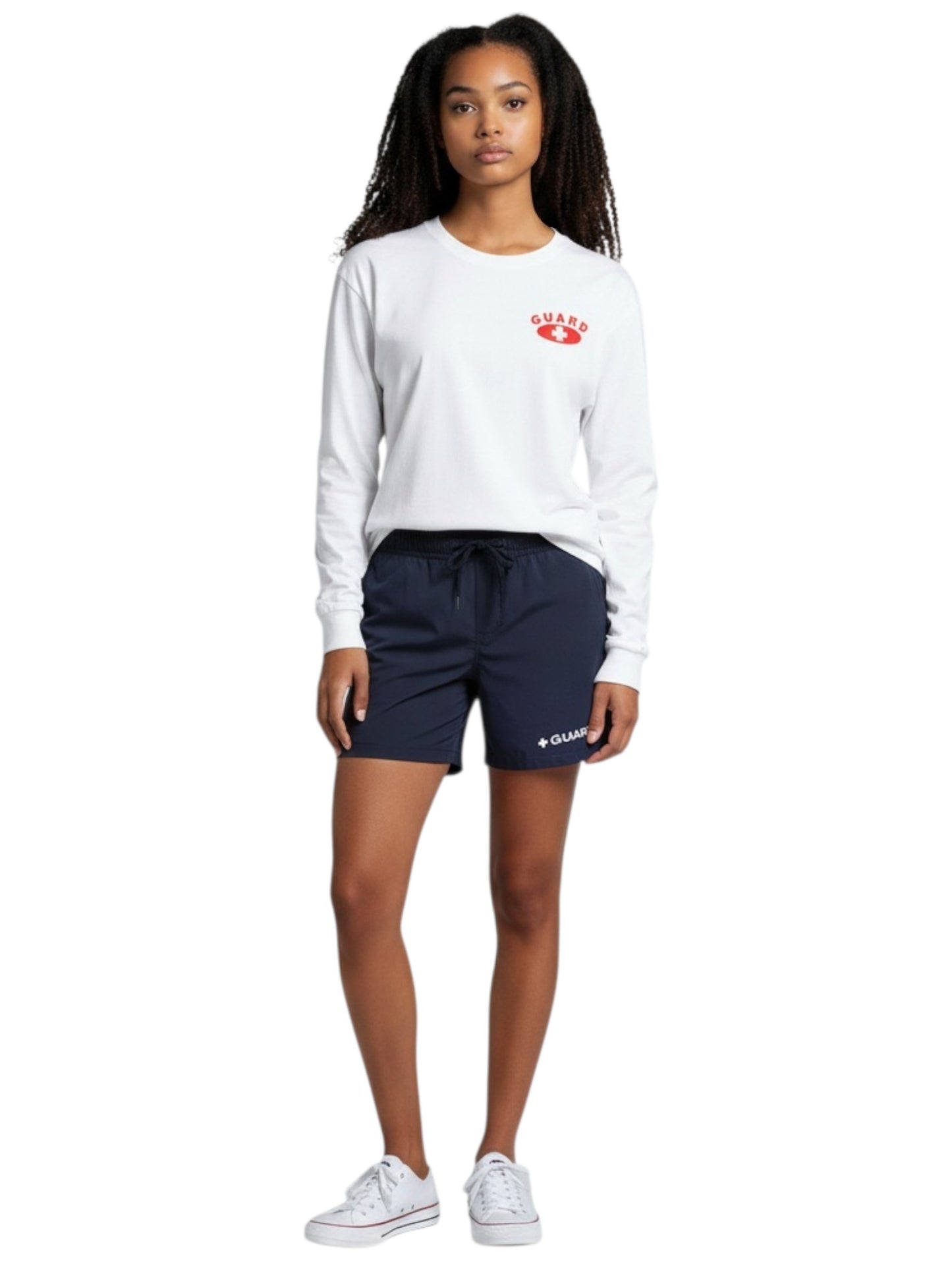 A model wearing The Lifeguard Store white long sleeve cotton guard t-shirt with red logo and navy blue shorts.