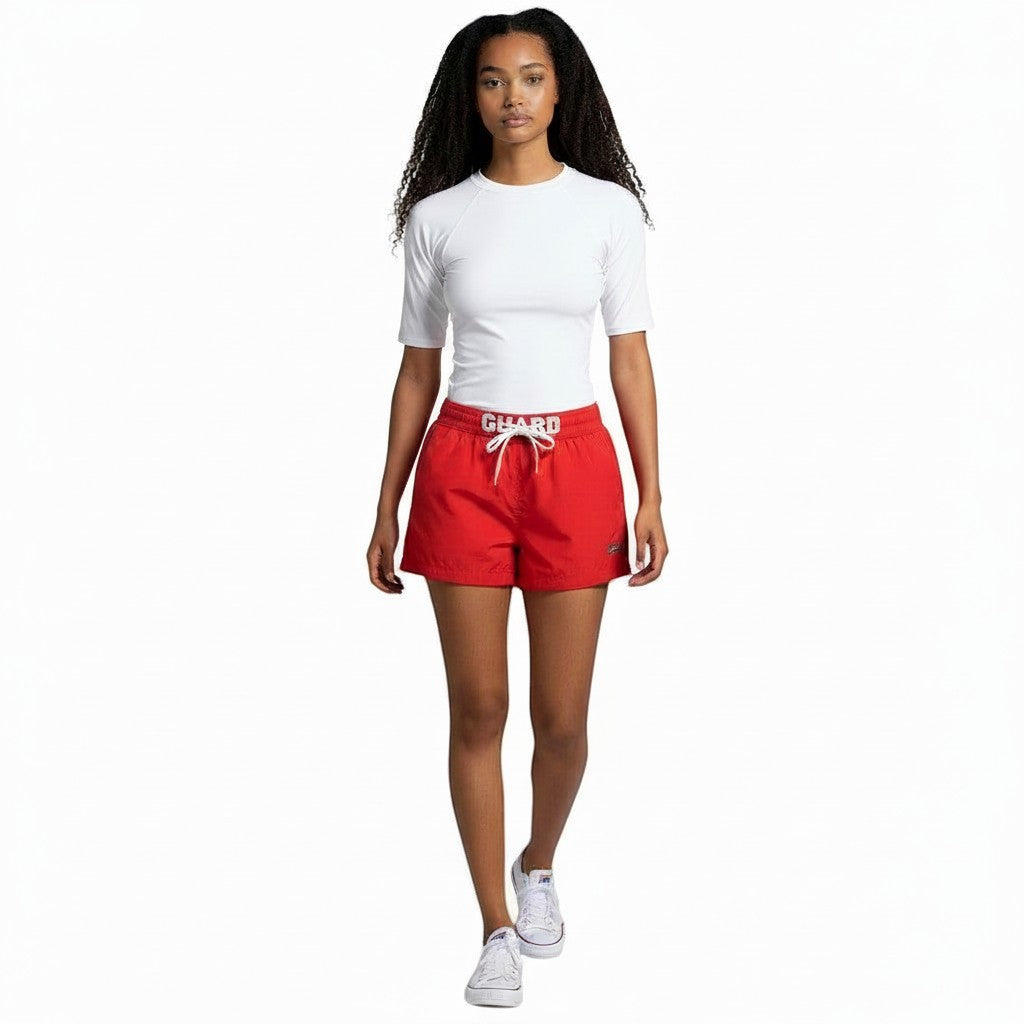 The Lifeguard Store women's white short sleeve crew neck rashguard made of polyester and spandex blend.