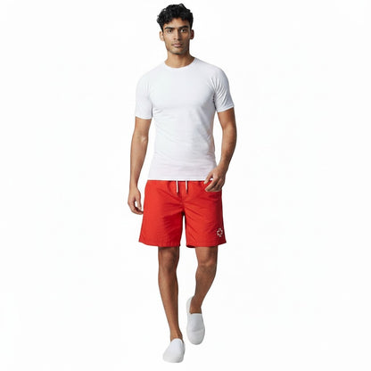 The Lifeguard Store men's white short sleeve crew neck rashguard made of polyester and spandex blend.