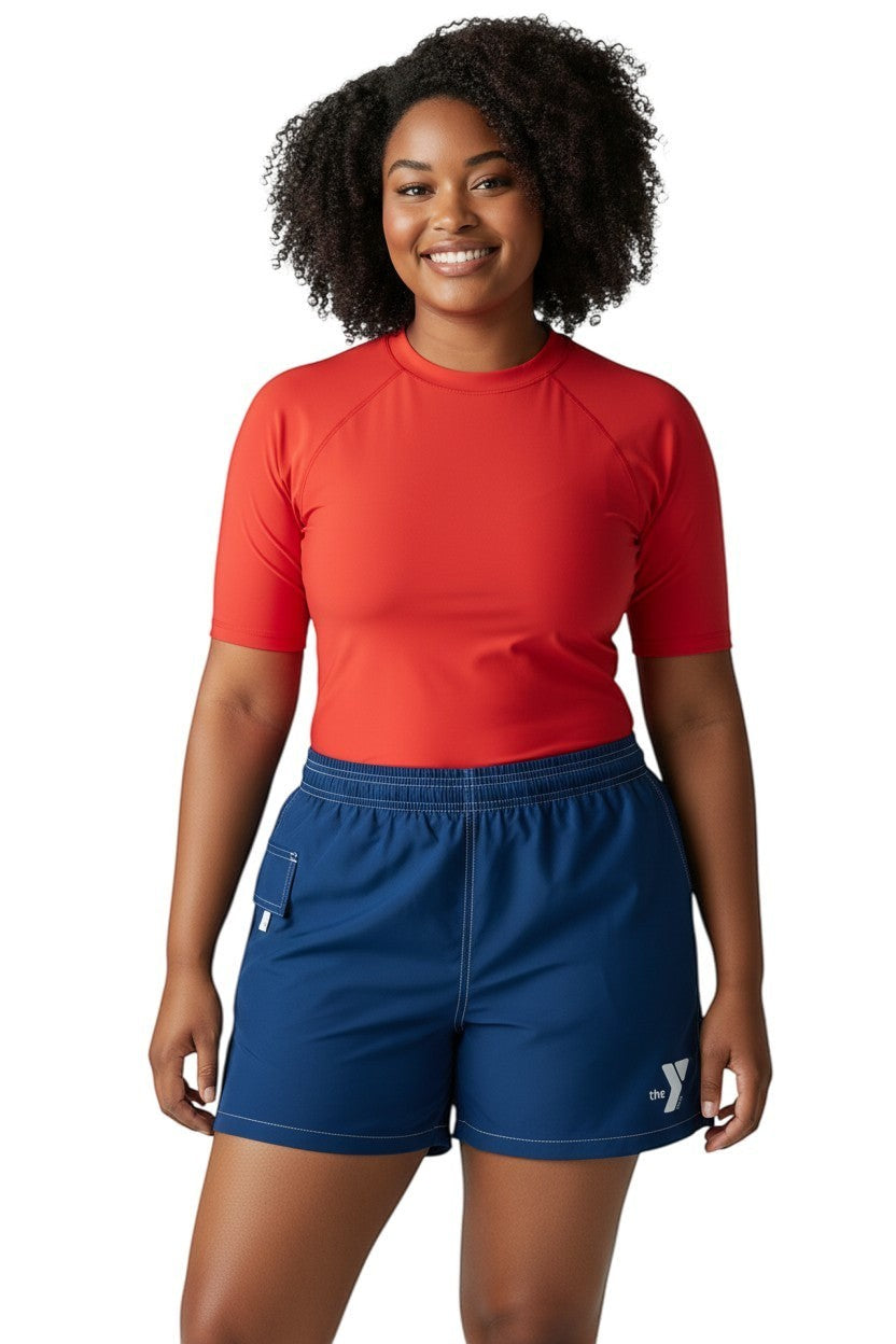 The Lifeguard Store blue polyester/spandex YMCA board shorts with 3" inseam, elastic waistband, and side pocket.