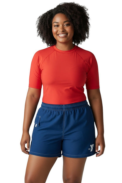 The Lifeguard Store blue polyester/spandex YMCA board shorts with 3" inseam, elastic waistband, and side pocket.