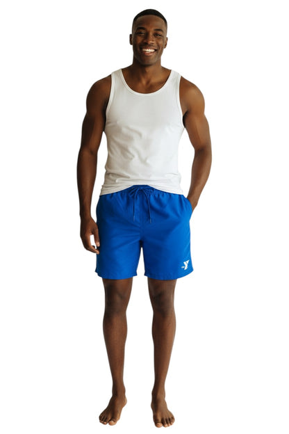 The Lifeguard Store blue YMCA board shorts with elastic waistband, drawstring, and velcro cargo pocket. 7" inseam.